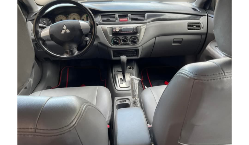 
								Mitsubishi Lancer 2010 full									